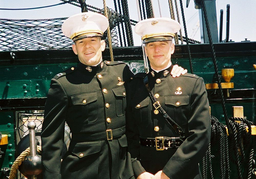 Elliot Ackerman and Douglas Zembiec in Marine dress blues aboard the USS Constitution, 2003.