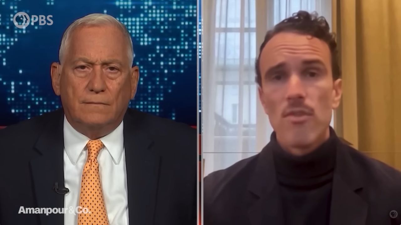 Walter Isaacson interviewing Elliot Ackerman on Amanpour & Company during a discussion about Ukraine, Russia, military strategy, and the war in Kyiv