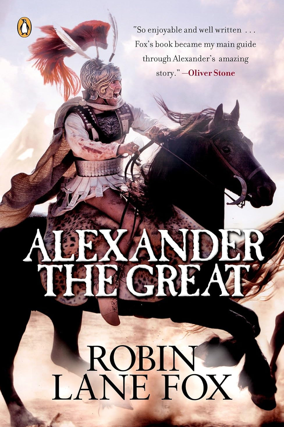 Book cover for Alexander the Great by Robin Lane Fox, featuring an armored Macedonian warrior riding a black horse beneath a cloudy sky. The Penguin logo appears at the upper left, with a recommendation from Oliver Stone above the large white title and the author’s name at the bottom.